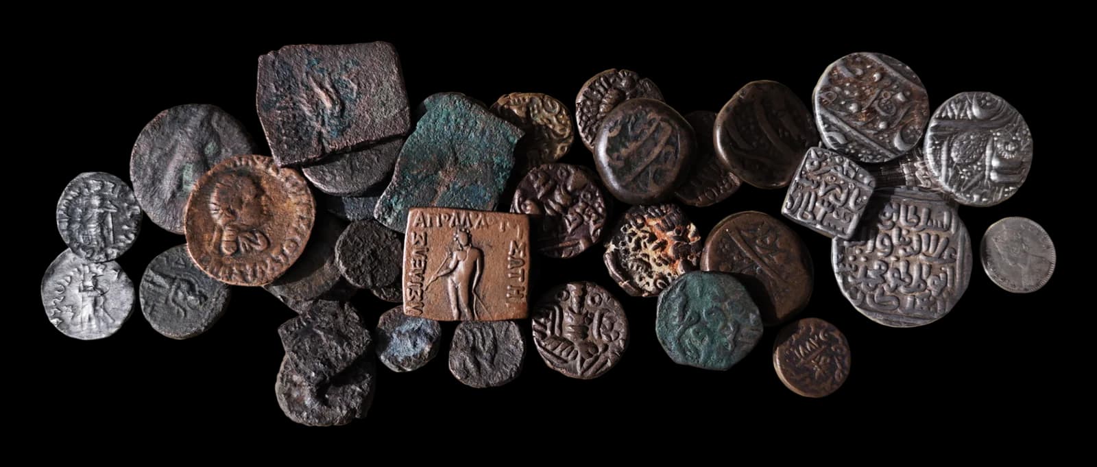 Scattered collection of antique coins