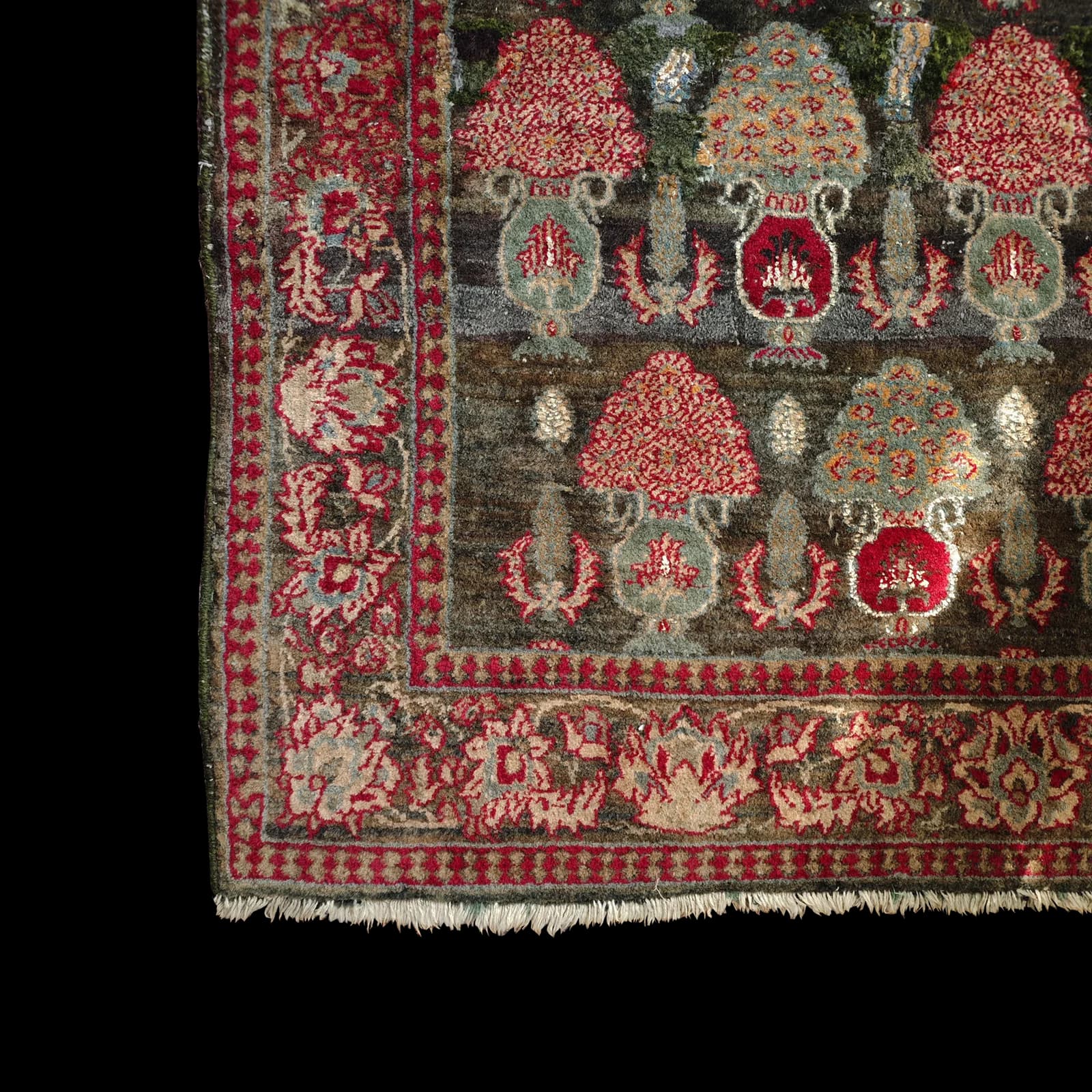 Hand-knotted Kashmiri carpet with traditional motifs