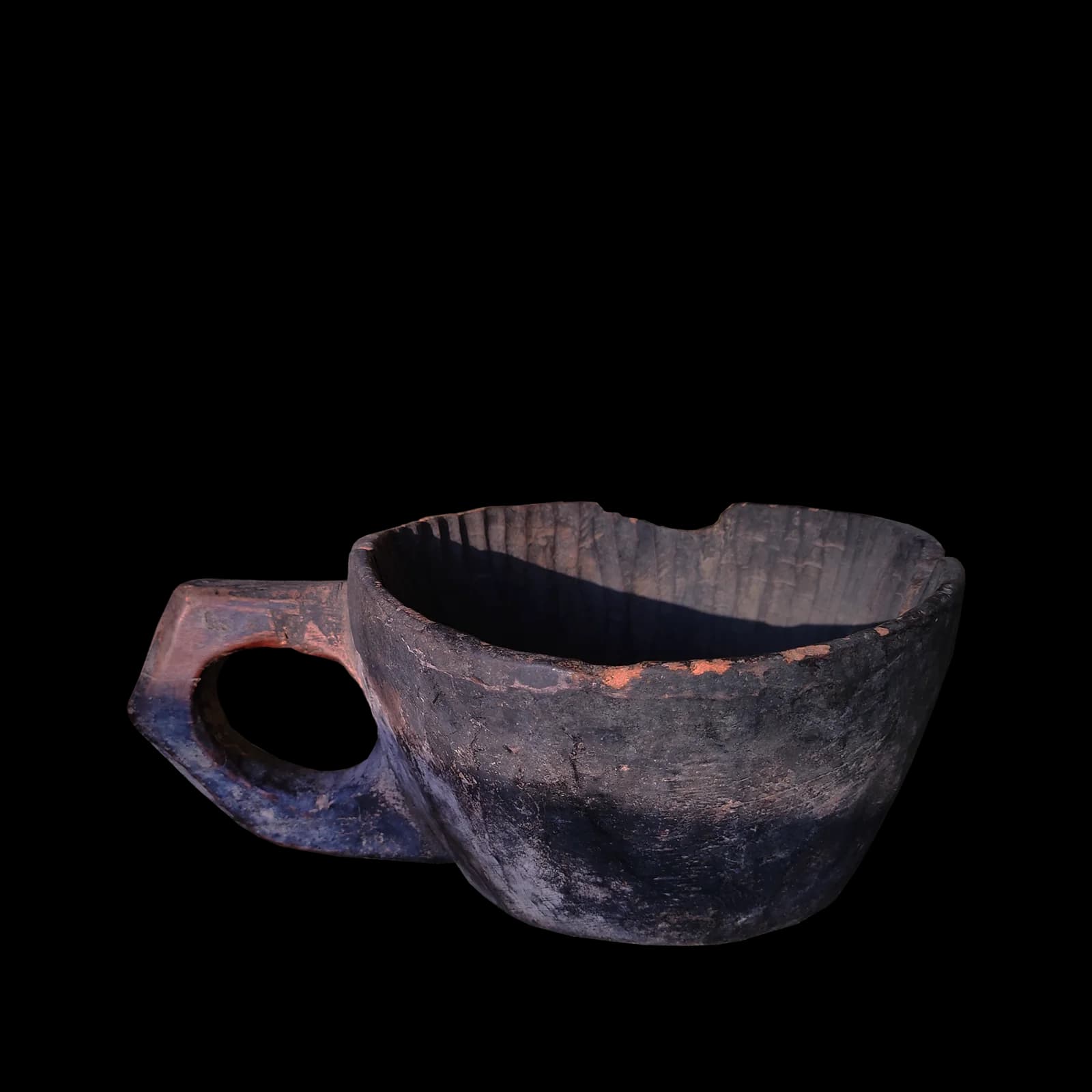 Large hand-carved wooden bowl with a handle